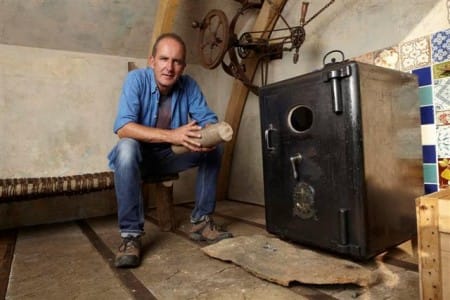 Kevin McCloud with his home made oven, constructed using an old safe